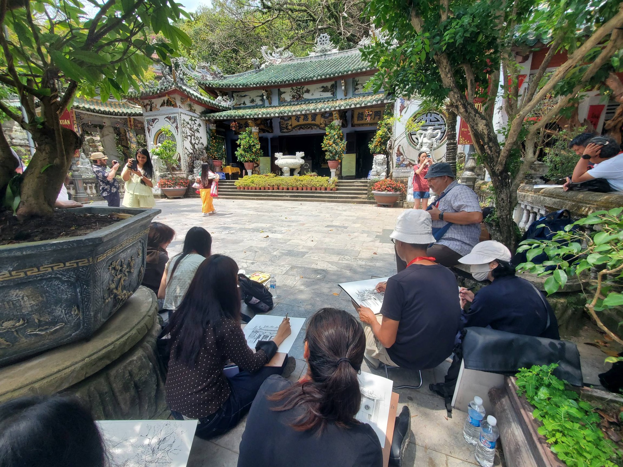 Participants sketching and observing architecture during the ASEAN watercolor study program