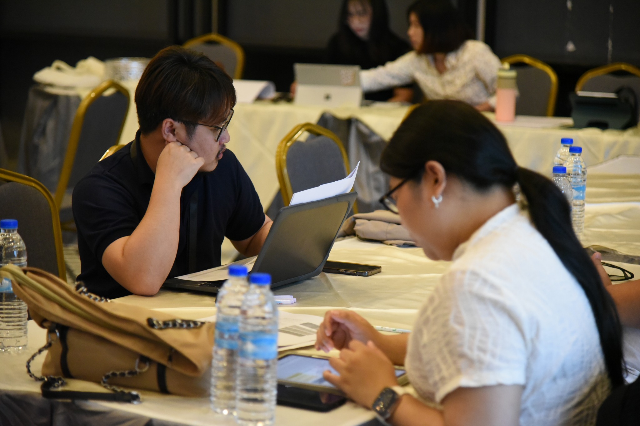 Strategic review session involving administrators, lecturers, and support staff